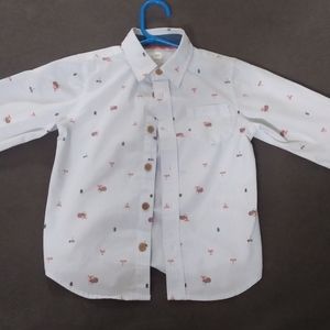 Buttoned up boys dress shirt.